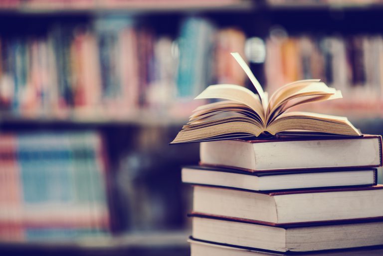 book-library-with-open-textbook-1-768x513 Koleksi Pustaka